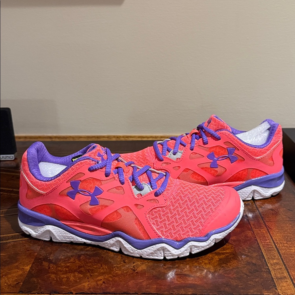 NWOT Under Armour Women's Micro G Monza running shoe in orange and purple size 8